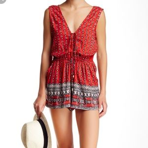 Red lace-up romper